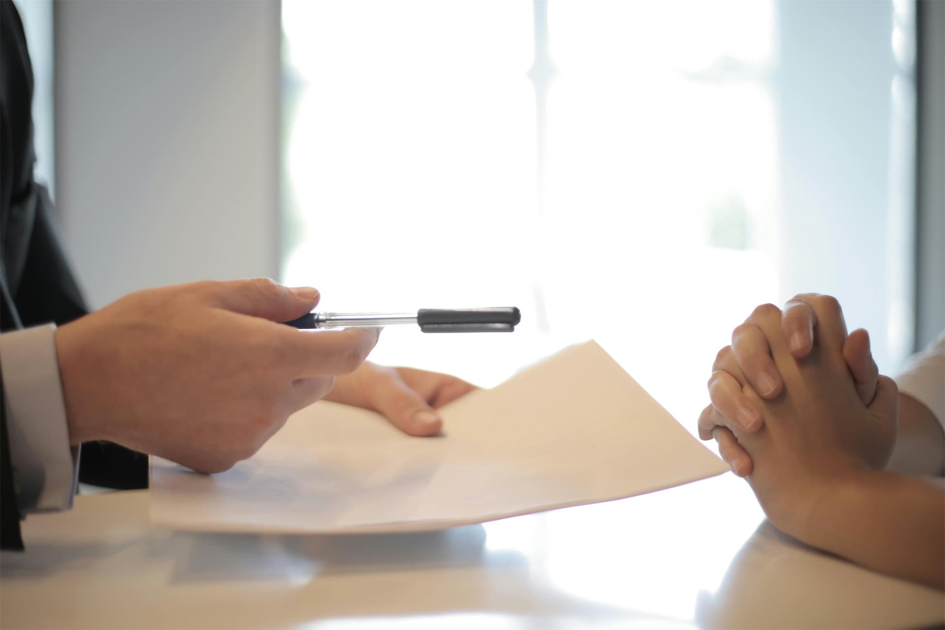 Legal documents and calculator representing costs in small claims cases